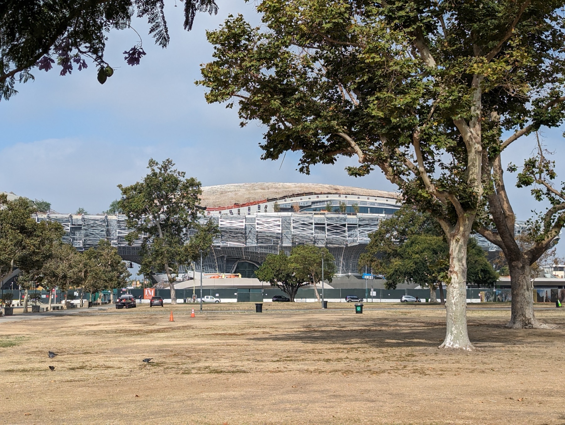 The curved white exterior of the Lucas Museum of Narrative Art under construction in Los Angeles in 2023